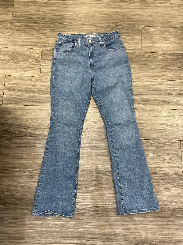 Jeans Boot Cut By Levis In Blue, Size: 12